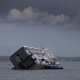 Illustration for article titled These Photos Of That Grounded Car Carrier Ship Are Beautifully Surreal